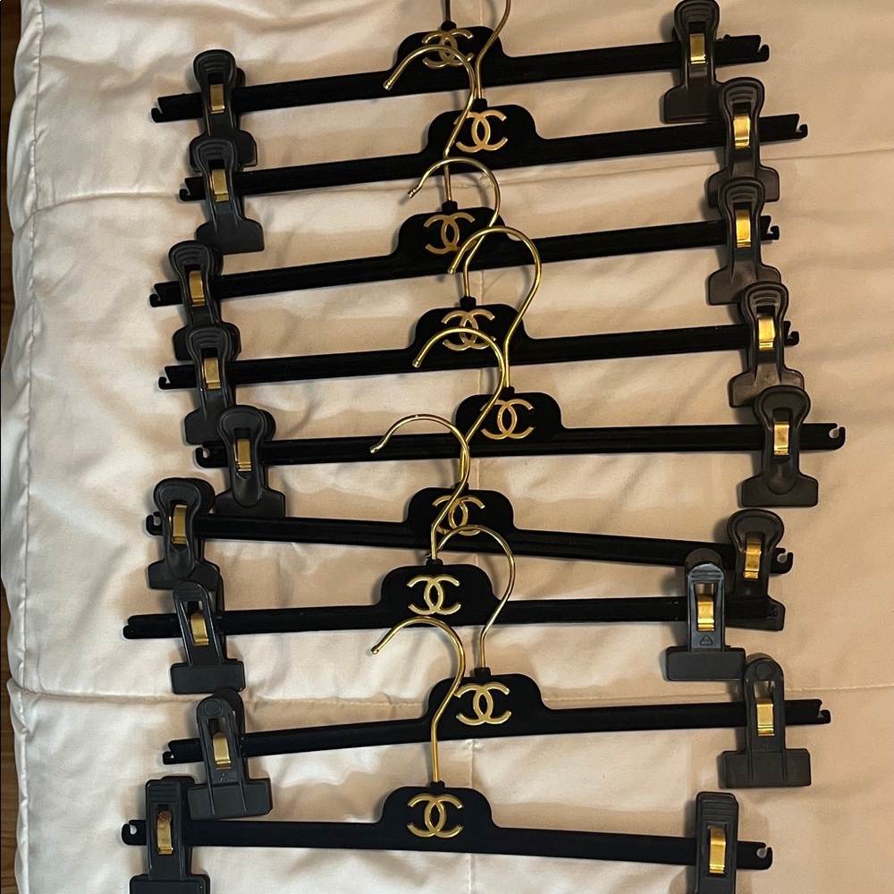CHANEL Elegant Black and Gold Hanger Collection